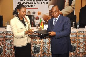 Signature of the letter of intent and exchange of initials between Louis Paul Motaze and Mareme Mbaye Ndiaye